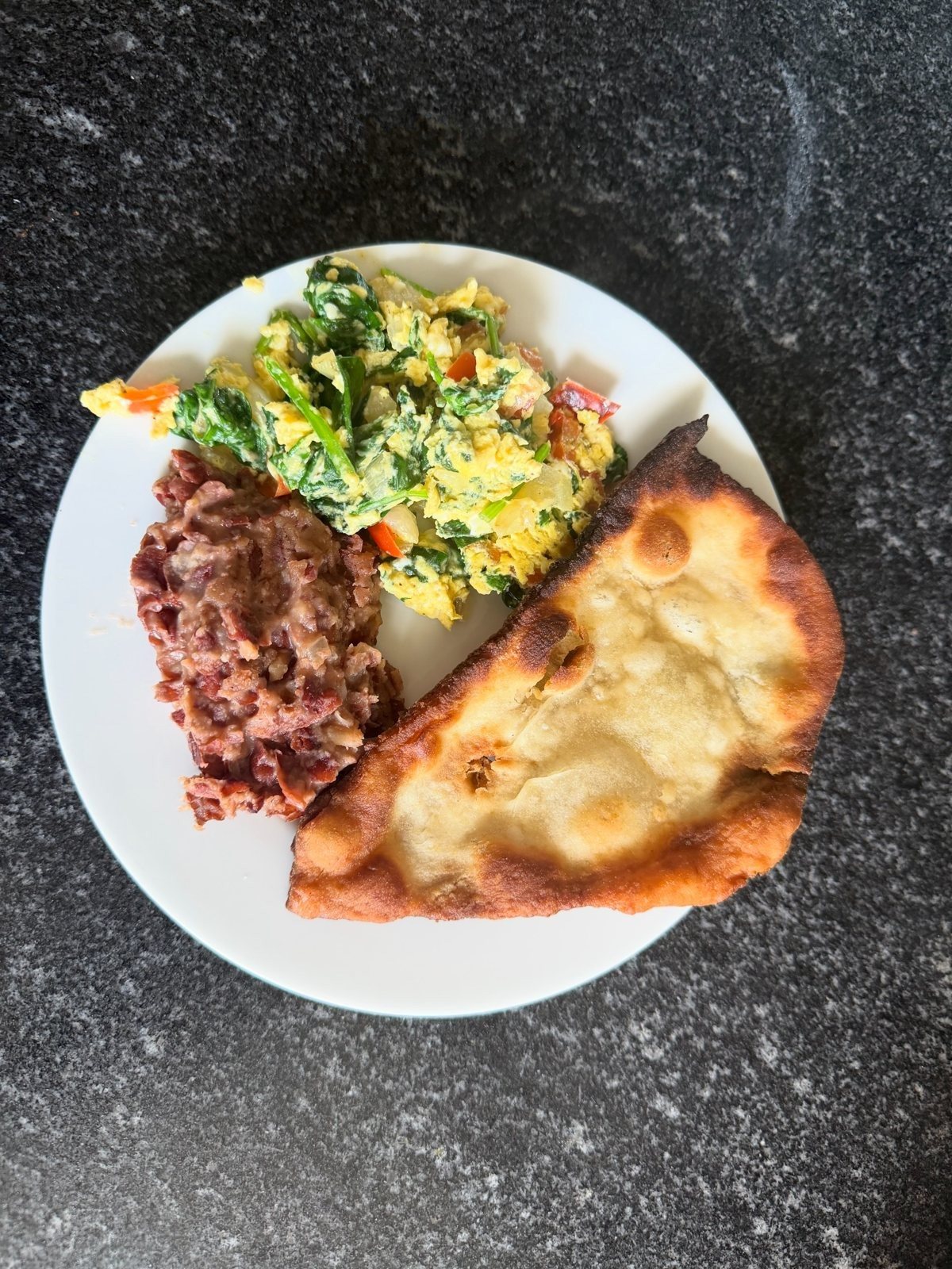Fry jacks, refried beans, and chaya eggs from Belize